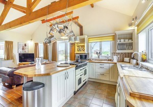 Traditional two bedroomed lodge with two double rooms.