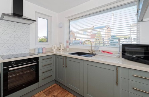 Ogden House | A cosy but modern bungalow with large secured & private garden.