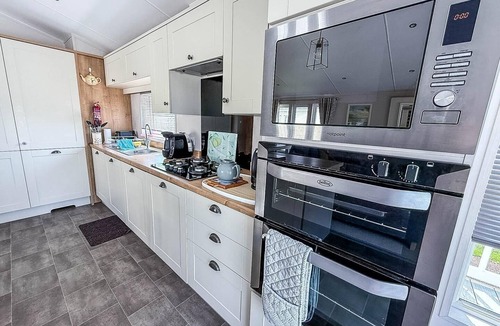 Hunstanton Cabin | Beautiful 4 berth lodge with decking at Manor Park in Hunstanton ref 23038C