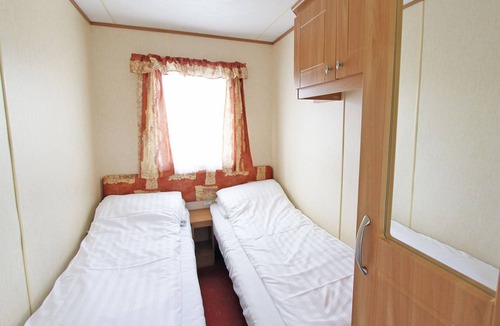Alford House | Caravan with one double and two twin.