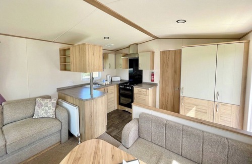 Alford House | Caravan with one double and one twin.
