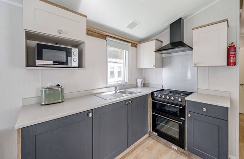 Longridge House | Caravan with one double and two twin.
