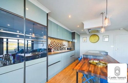 Cayton Bay Villa | Castle View: Beachfront Luxury Home with Hot Tub, Ocean Views & Family Amenities