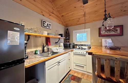 Town of Webb Cottage | Charming 1-Bedroom Cottage with wood-burning fireplace
