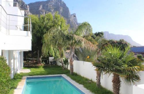 Camps Bay Ski Chalet | Cozy Camps Bay House with mountain and sea view