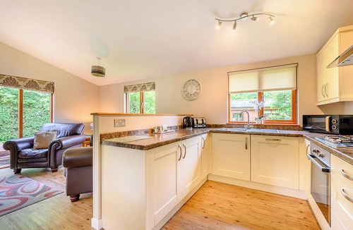 Allithwaite Ski Chalet | Deluxe lodge with one master double with en suite walk-in shower and one twin.