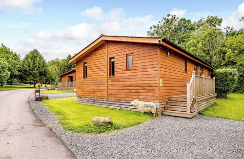 Allithwaite Ski Chalet | Deluxe lodge with one master double with en suite walk-in shower and one twin.