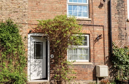Arnold Cottage | HORNSEA COTTAGE, pet friendly, with open fire in Leven Near Beverley