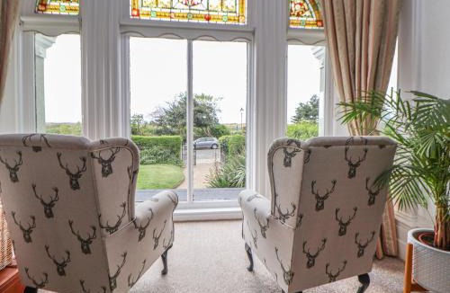 Waterloo House | Ismay Dining Room Suite - Titanic Interest Beach View