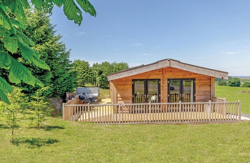 Ashover Ski Chalet | Luxurious lodge with stunning countryside views.