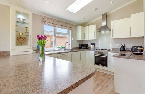 Aubourn Ski Chalet | Luxury lodge ideal for a couples romantic break away with a double driveway.