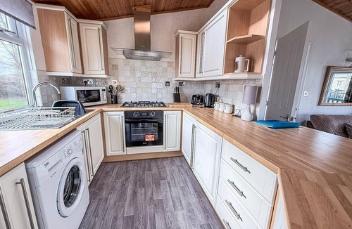 Hunstanton Cabin | Modern 4 berth lodge with decking at Manor Park in Hunstanton ref 23024W