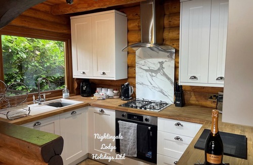 Dogdyke House | Nightingale Lodge, 2 Storey Scandinavian style lodge, Sleeps 8, Hot tub, Huge fishing deck