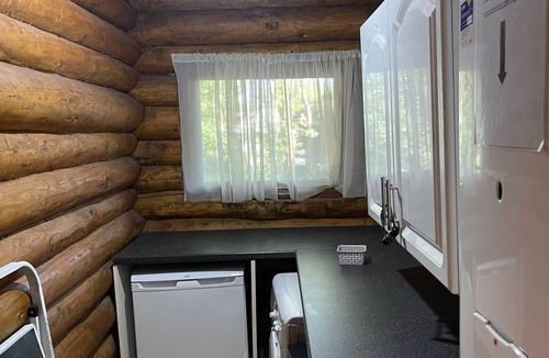 Dogdyke House | Nightingale Lodge, 2 Storey Scandinavian style lodge, Sleeps 8, Hot tub, Huge fishing deck