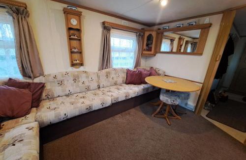 Ingoldmells Ski Chalet | Plum 3 a luxury 2 bed 6 berth static caravan, bedding included, secure veranda with ramped access on Coral Beach in Ingoldmells