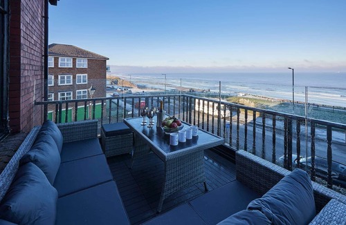 Saltburn-by-the-Sea Apartment | Seafront location, luxurious spacious, dog-friendly, balcony, garden, pool table, sea & beach views.
