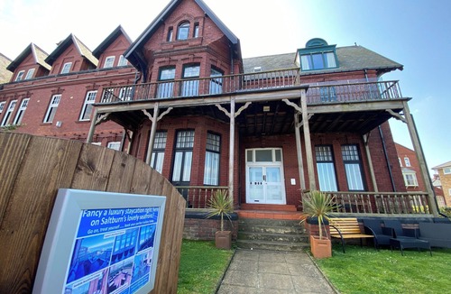 Saltburn-by-the-Sea Apartment | Seafront location, luxurious spacious, dog-friendly, balcony, garden, pool table, sea & beach views.