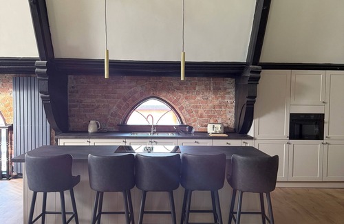 Birkdale House | Stay in a converted church, 5 king-size ensuite bedrooms, openplan living space.