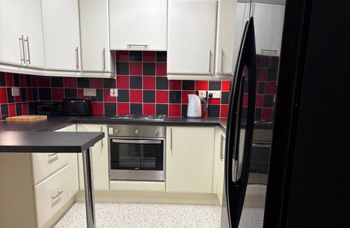Brighouse Cottage | THE LODGE, pet friendly, with a garden in Brighouse