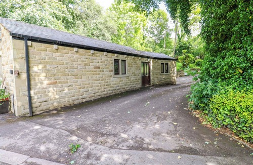 Brighouse Cottage | THE LODGE, pet friendly, with a garden in Brighouse