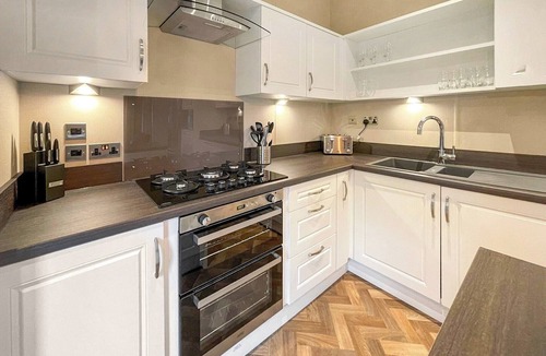 Langham House | This exclusive holiday home boasts a stylish and contemporary design.
