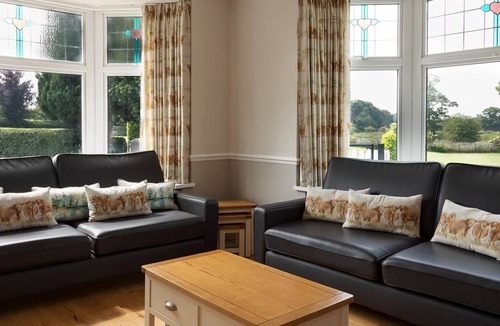 Darlington Cottage | This property is in a stunning location, it boasts a private hot tub and games rooms.