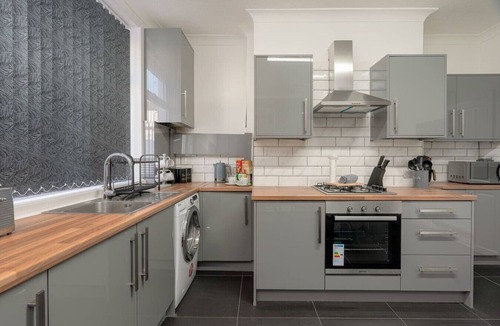 Colne House | Two-bedroom home with games, fireplace and fast Wi-Fi