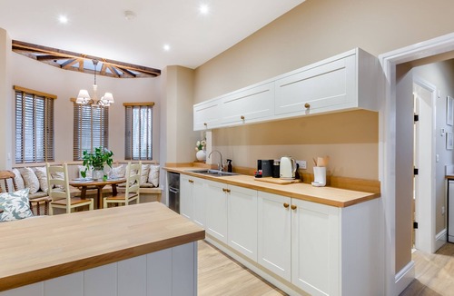 Driffield Cottage | We love this historic lodge with large garden and wood fired hot tub.