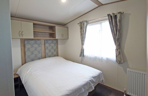 Alford House | Wheelchair friendly caravan with one double and one twin.