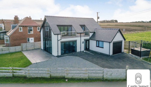 Castle View: Beachfront Luxury Home with Hot Tub, Ocean Views & Family Amenities
