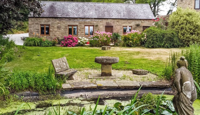 Characterful cottage with beautiful country views, set in own private grounds.