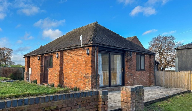 Charming single-storey barn conversion on a working farm.