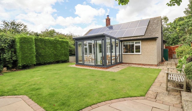 MANOR COTTAGE, pet friendly, with open fire in Embleton