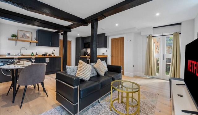 Modern & Historic Mill Flat with Stream Views in Surrey