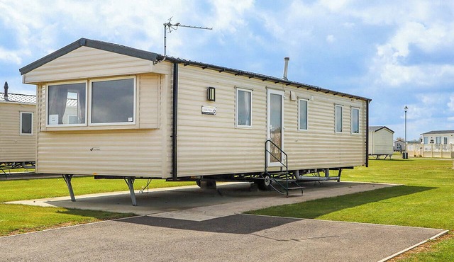 Quality 12ft-wide caravan with one double and two twin.