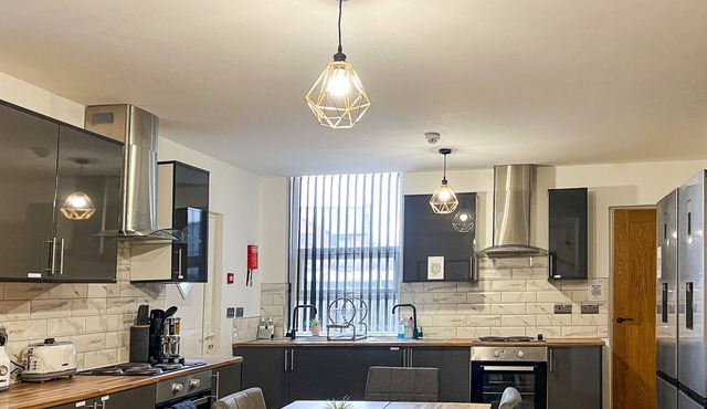 Spacious 9-Bed Home with Large Driveway