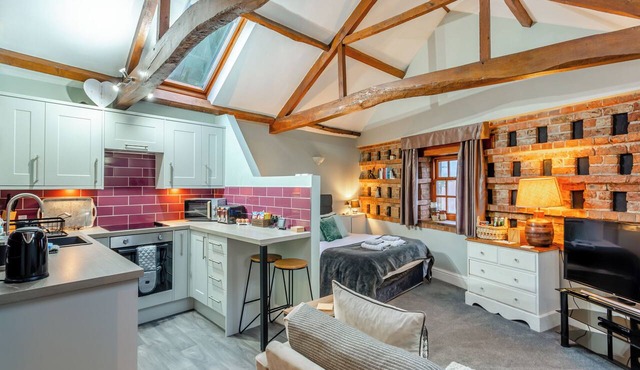 This peaceful position is surrounded by beautiful countryside and walks.