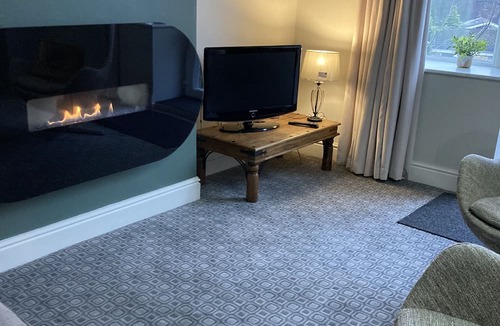 Mytholm Apartment | Stay in a grand old house, close to Hebden Bridge with parking & pet friendly.