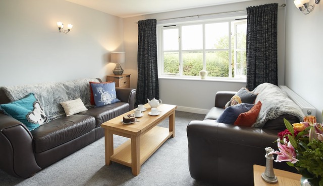 Two bedroomed property situation in a beautiful secluded location with patio area overlooking fields